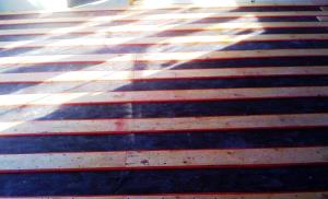 Radiant floor heating installation by Rescomm PHC Inc.