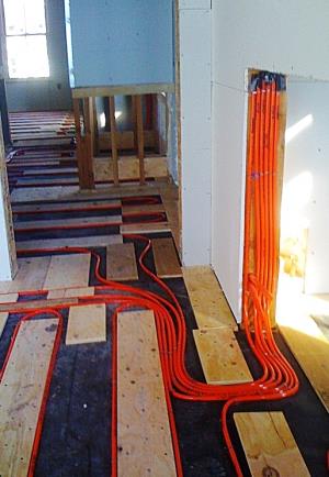 Radiant floor heating installation by Rescomm PHC Inc.