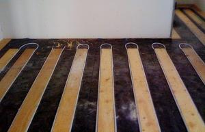 Radiant floor heating installation by Rescomm PHC Inc.